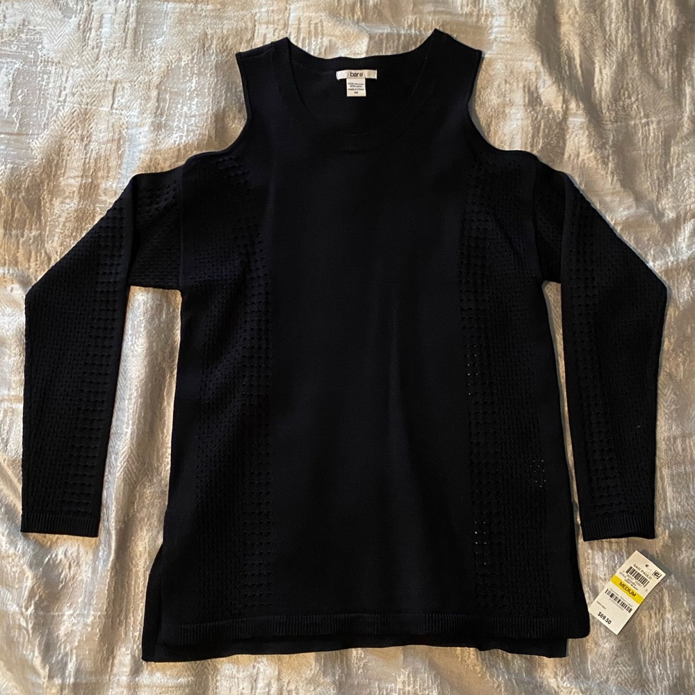 Sweater with cut out shoulders